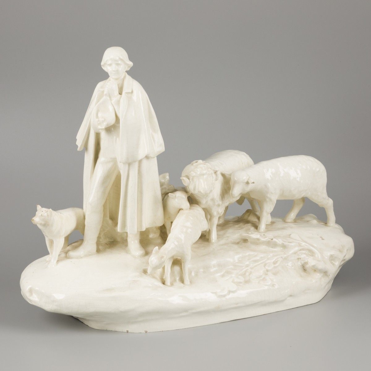 A pale white earthenware sculptural group, shepherd with flock of sheep, H. Schu&hellip;