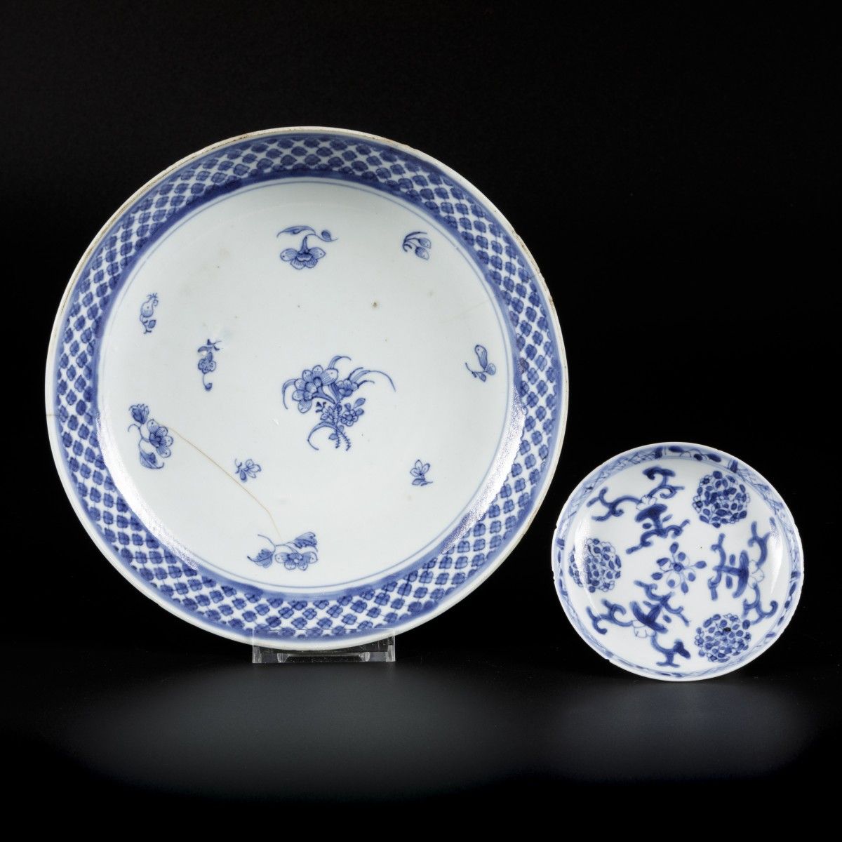 A deep porcelain plate and one saucer with floral decoration, China, 18th centur&hellip;