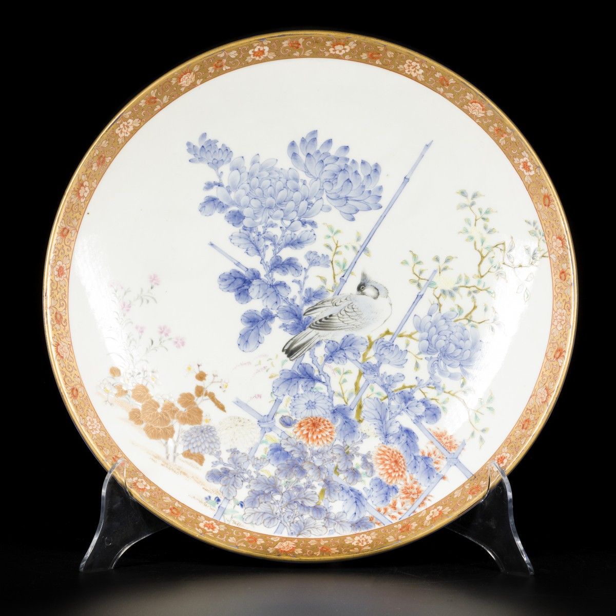 A porcelain charger decorated with a bird on a branch, Japan, 19th century. Durc&hellip;