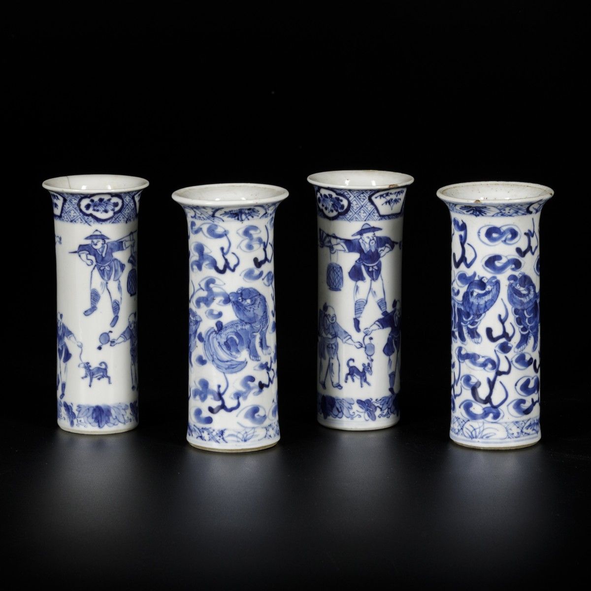 A lot of (4) porcelain vases with decor of foo-dogs and playing figures. China, &hellip;