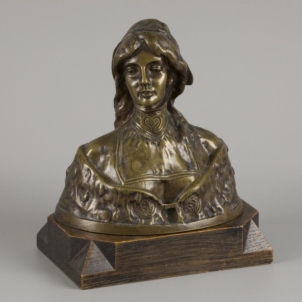 "S. Blanc". A bronze buste of a lady in traditional dress, 1st half 20th century&hellip;
