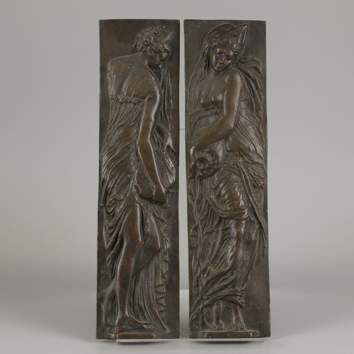 A set of (2) bronze reliefs of water nymphs, France, ca. 1900. Abm. 44 x 12 cm. &hellip;