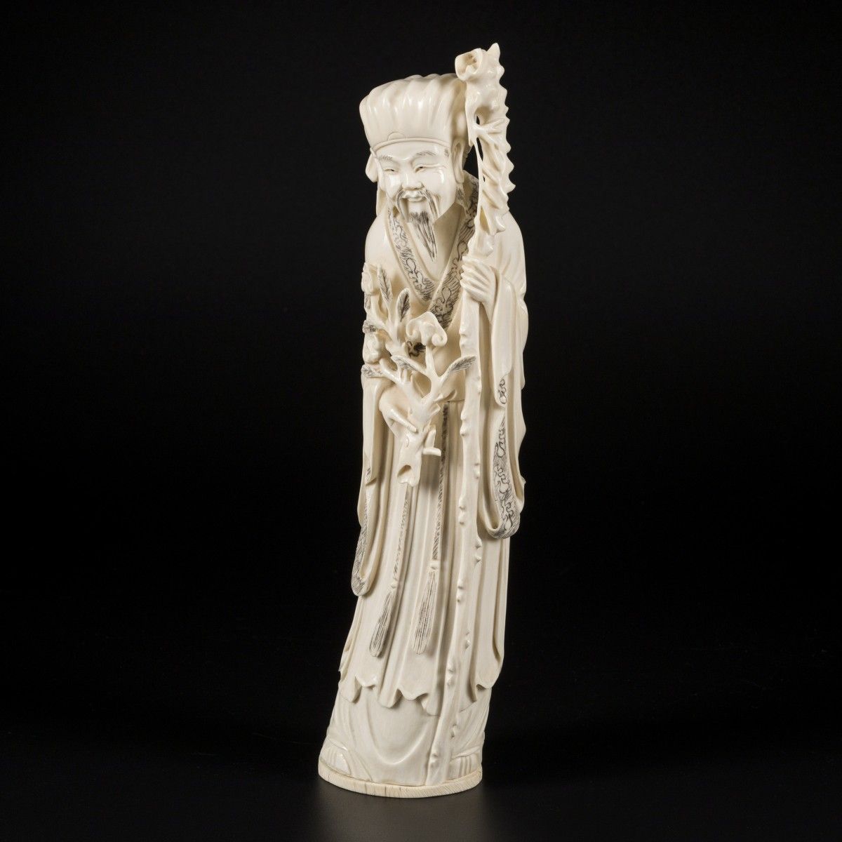An ivory sculpture of a Chinese gentleman, China, 1st half 20th century. Mes. 31&hellip;