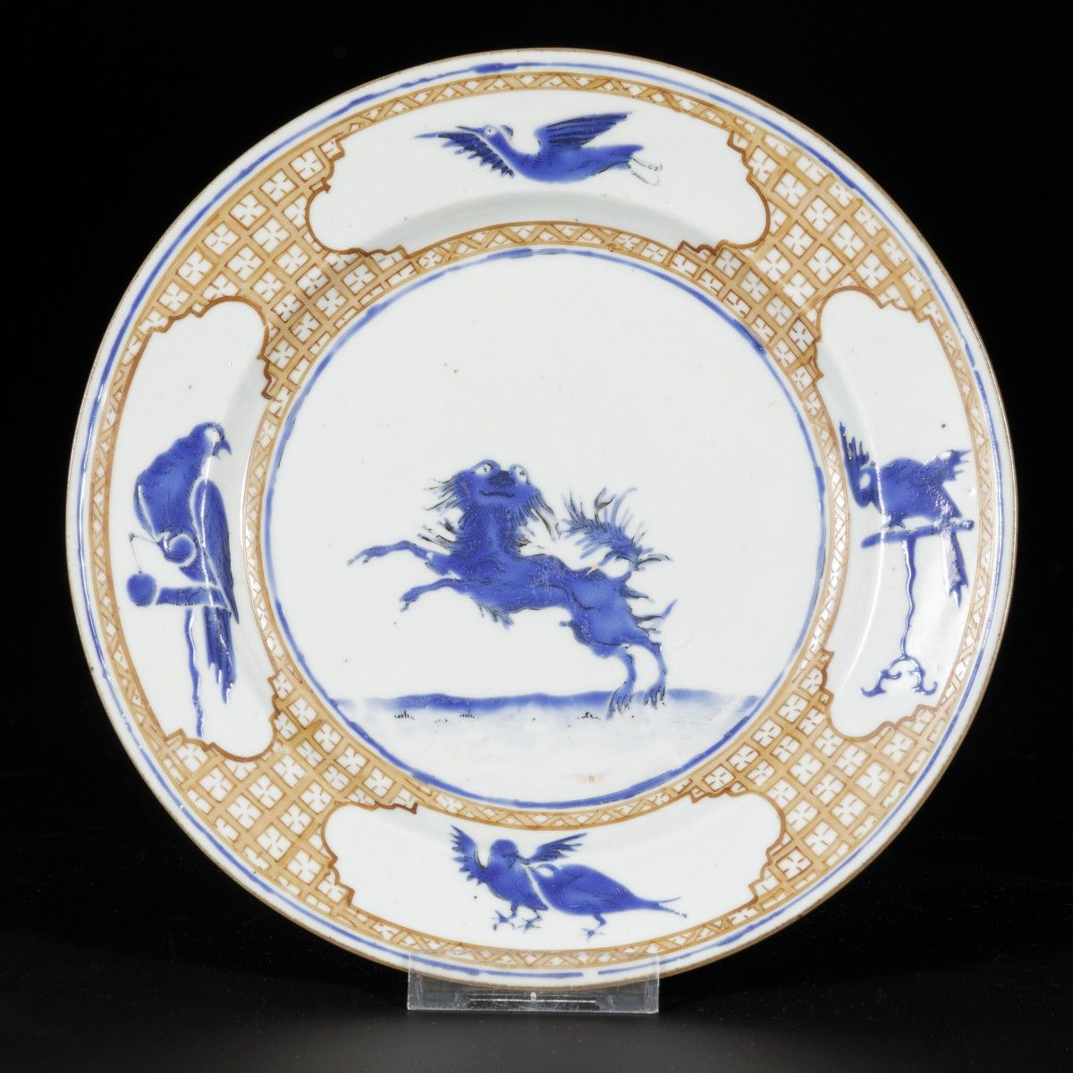 A porcelain plate "The Leaping Pekinese", based on a design by Cornelis Pronk, C&hellip;