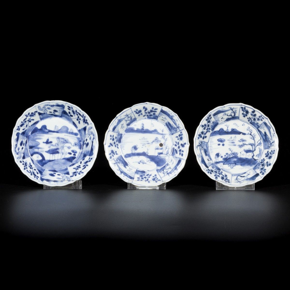 A lot comprising (3) porcelain plates with decor of river landscapes, serrated m&hellip;