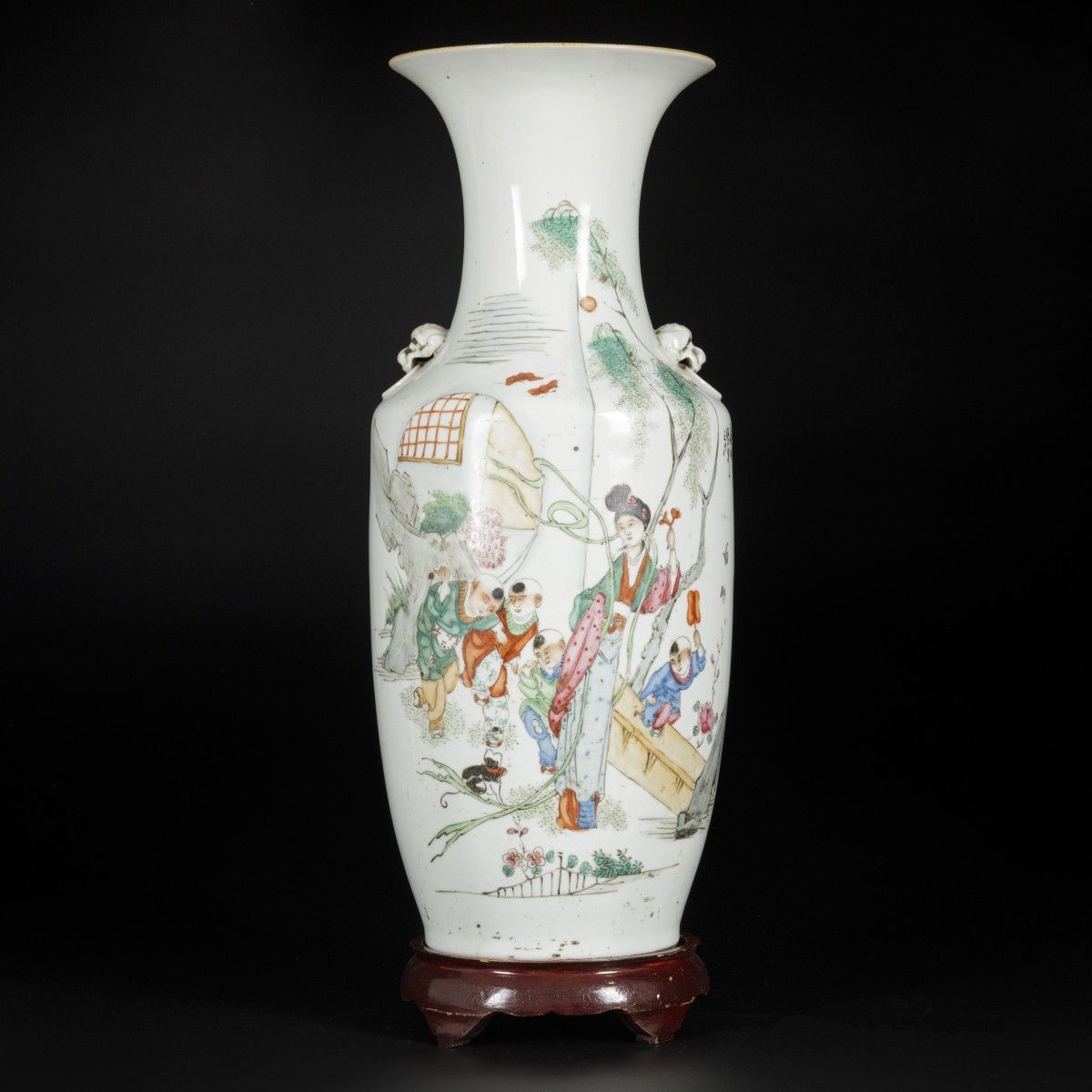 A porcelain Qiangjiang Cai vase with decoration of zotjes playing near a lice, C&hellip;