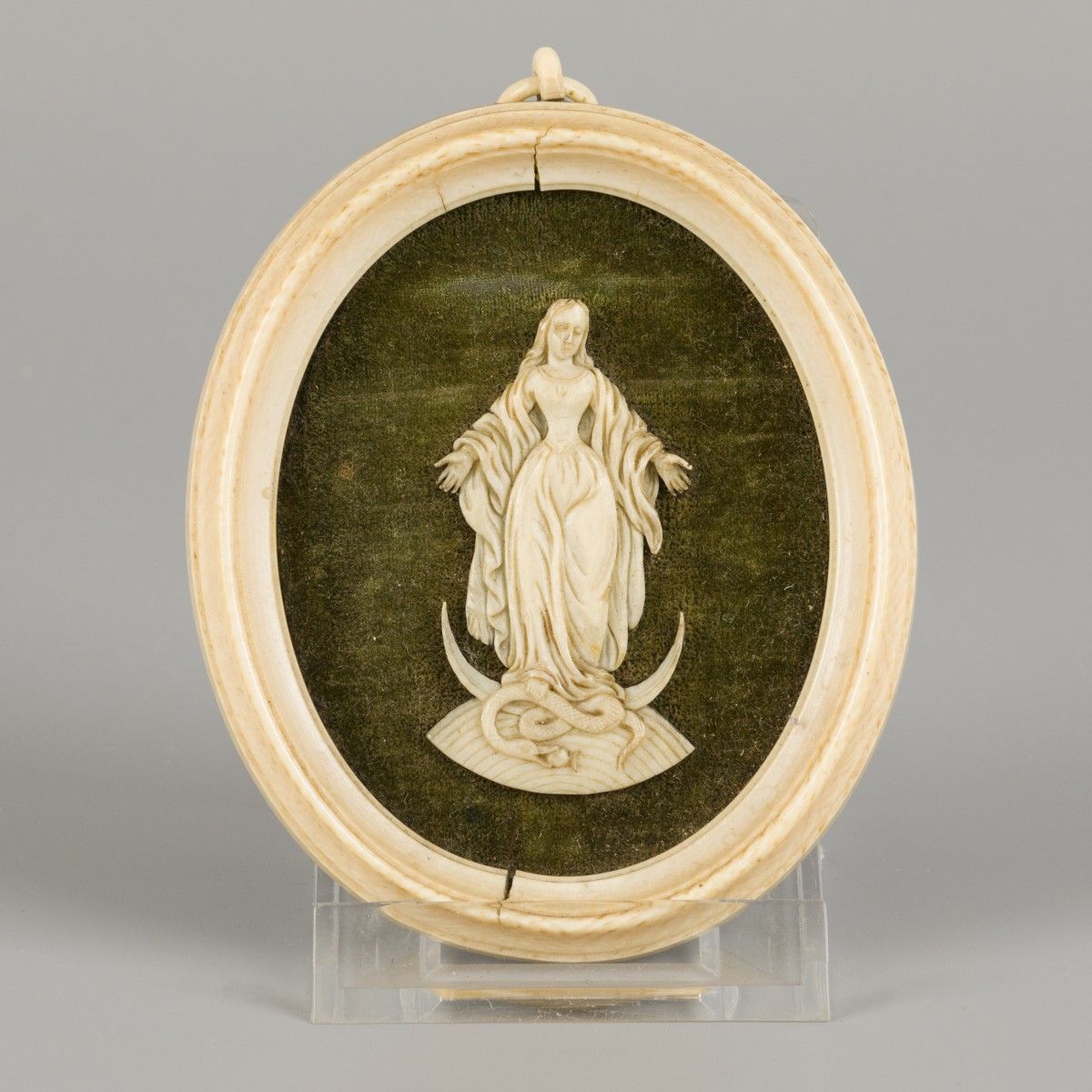 An ivory medallion with carved relief of a Madonna, Germany, 19th century. Madon&hellip;