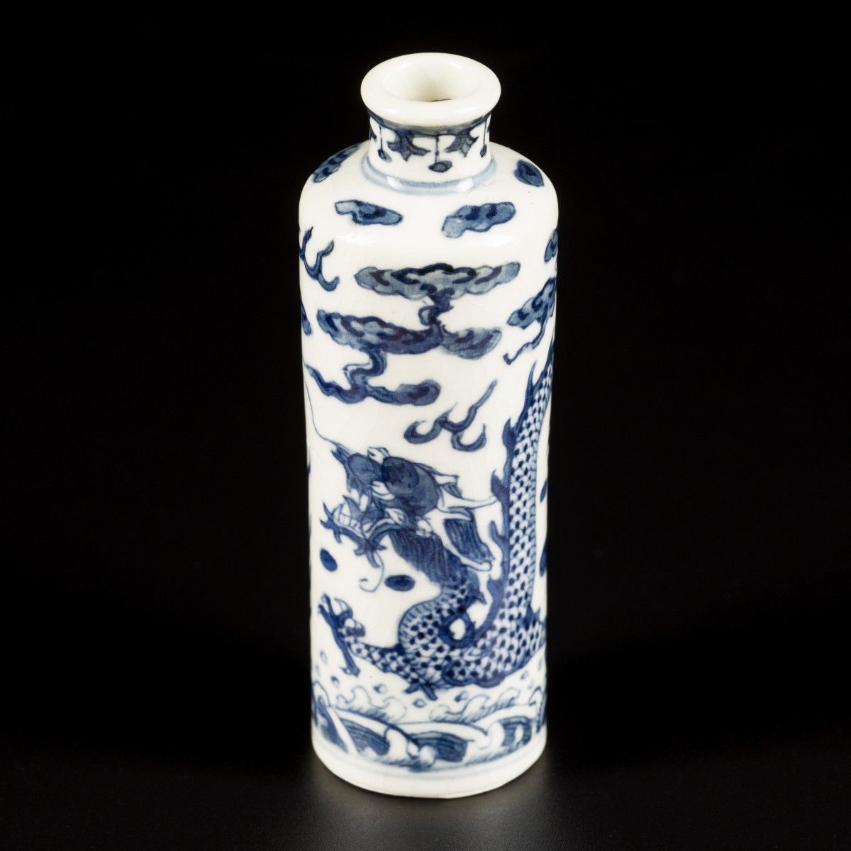 A softpaste snuff bottle with dragon decoration, China, 19th century. H. 9 cm. E&hellip;