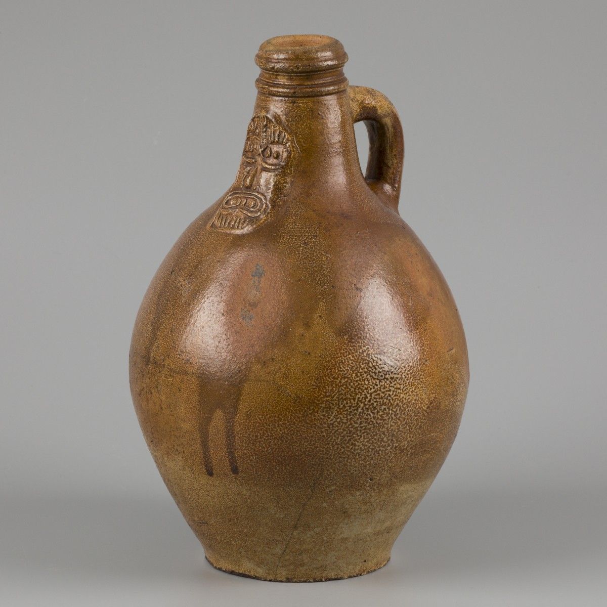 A bartmann/ 'Bartmann' stoneware jug with tiger salt glaze, (Cologne/ Frechen), &hellip;
