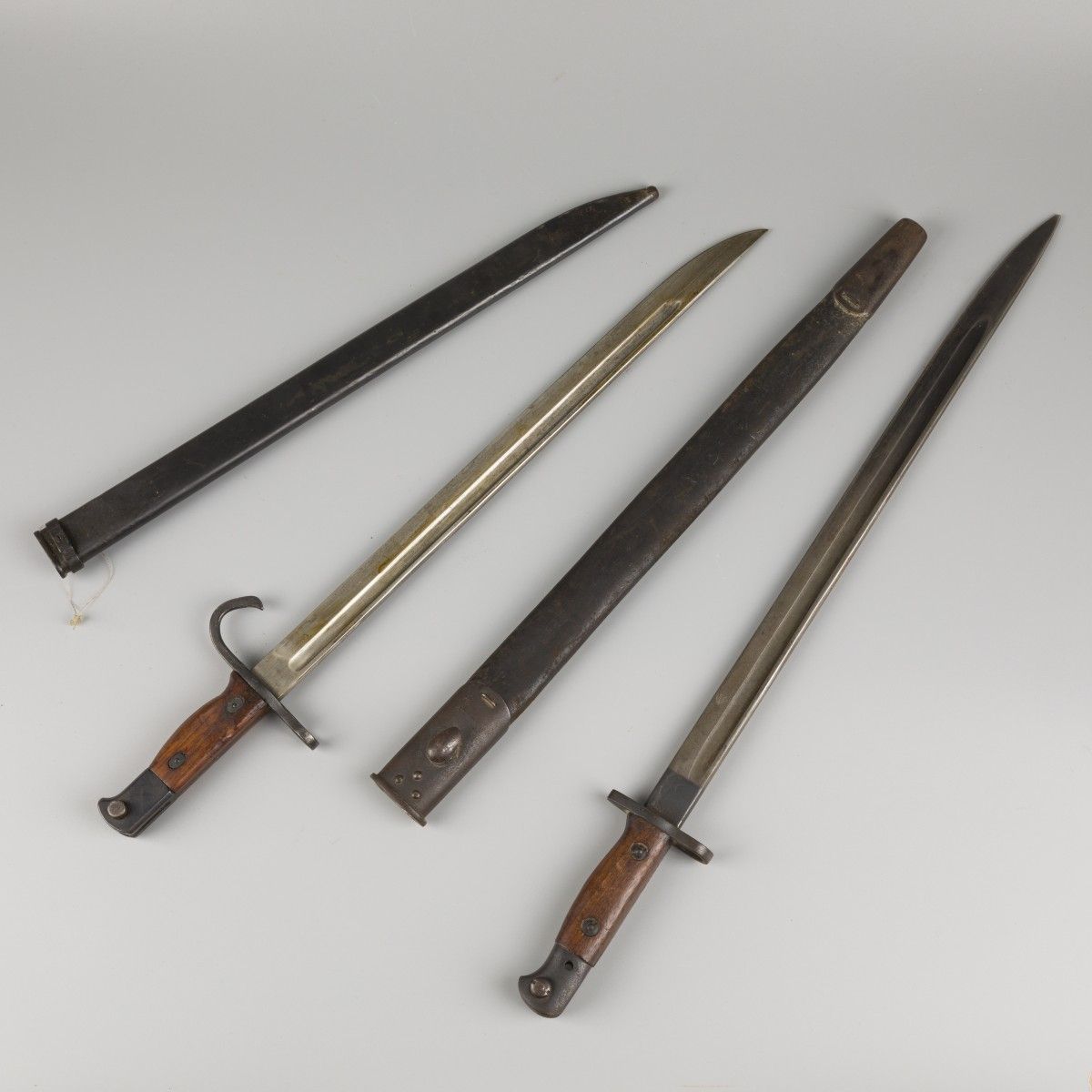 A lot comprised of (2) WOI British bayonets, 1st quarter 20th century. A.W. Une &hellip;