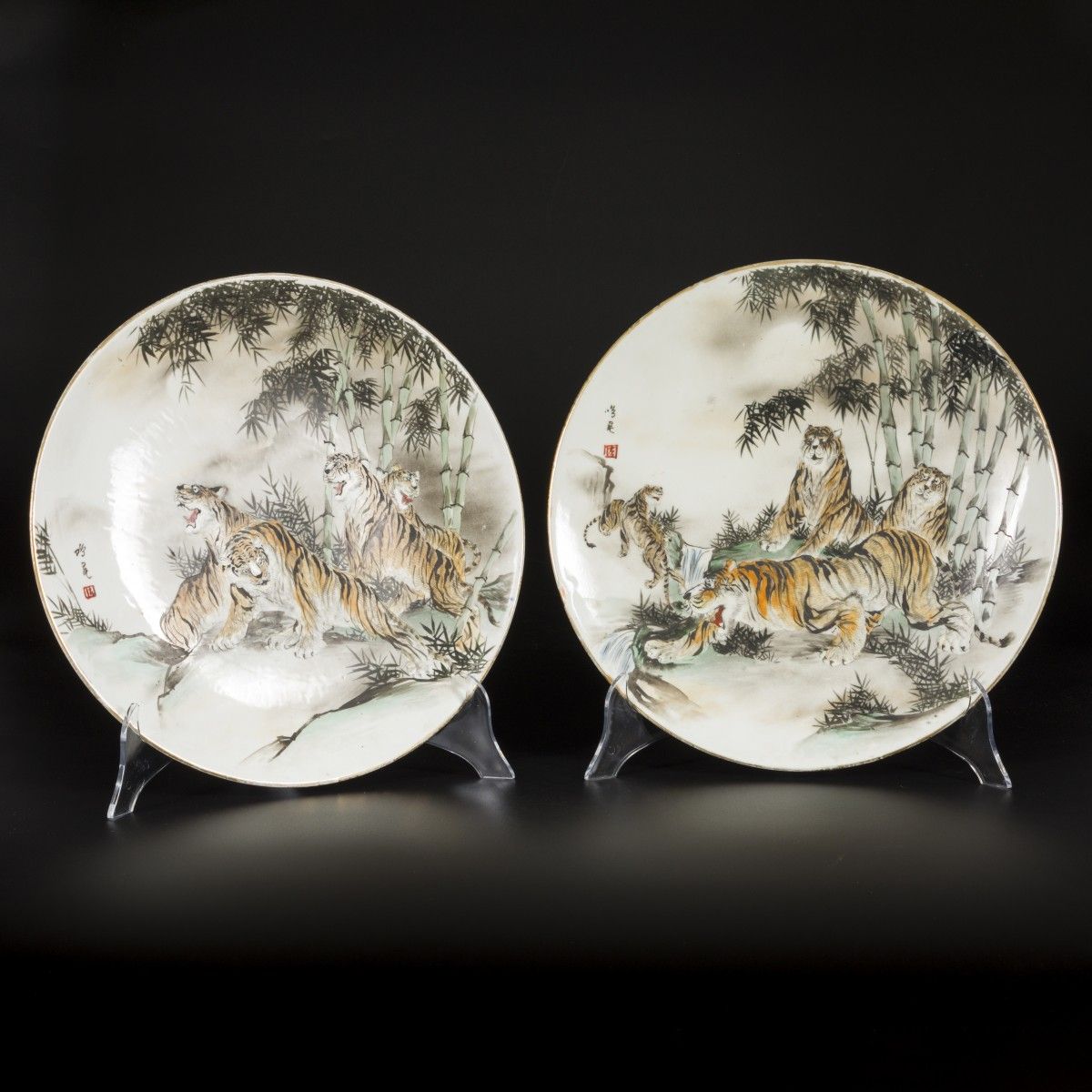 A set of (2) porcelain chargers decorated with tigers, Japan, 19th century. Durc&hellip;