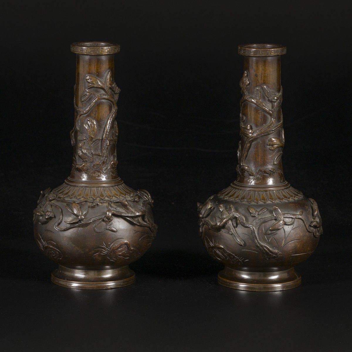 A set of (2) bronze pipe vases with decoration of flowers and birds, Japan, late&hellip;