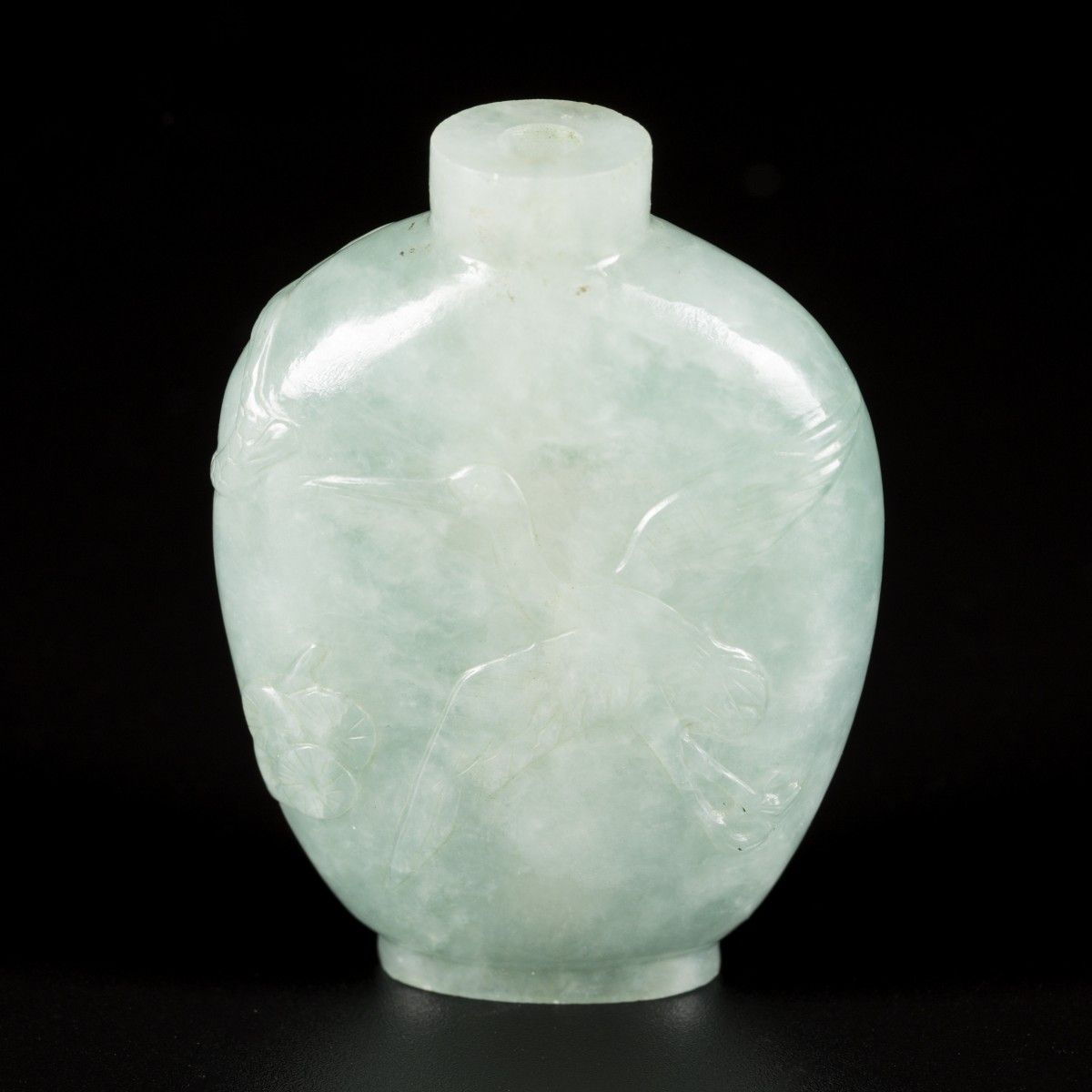 A jadeite snuff bottle decorated with crane and pinus, China, 1st half 20th cent&hellip;