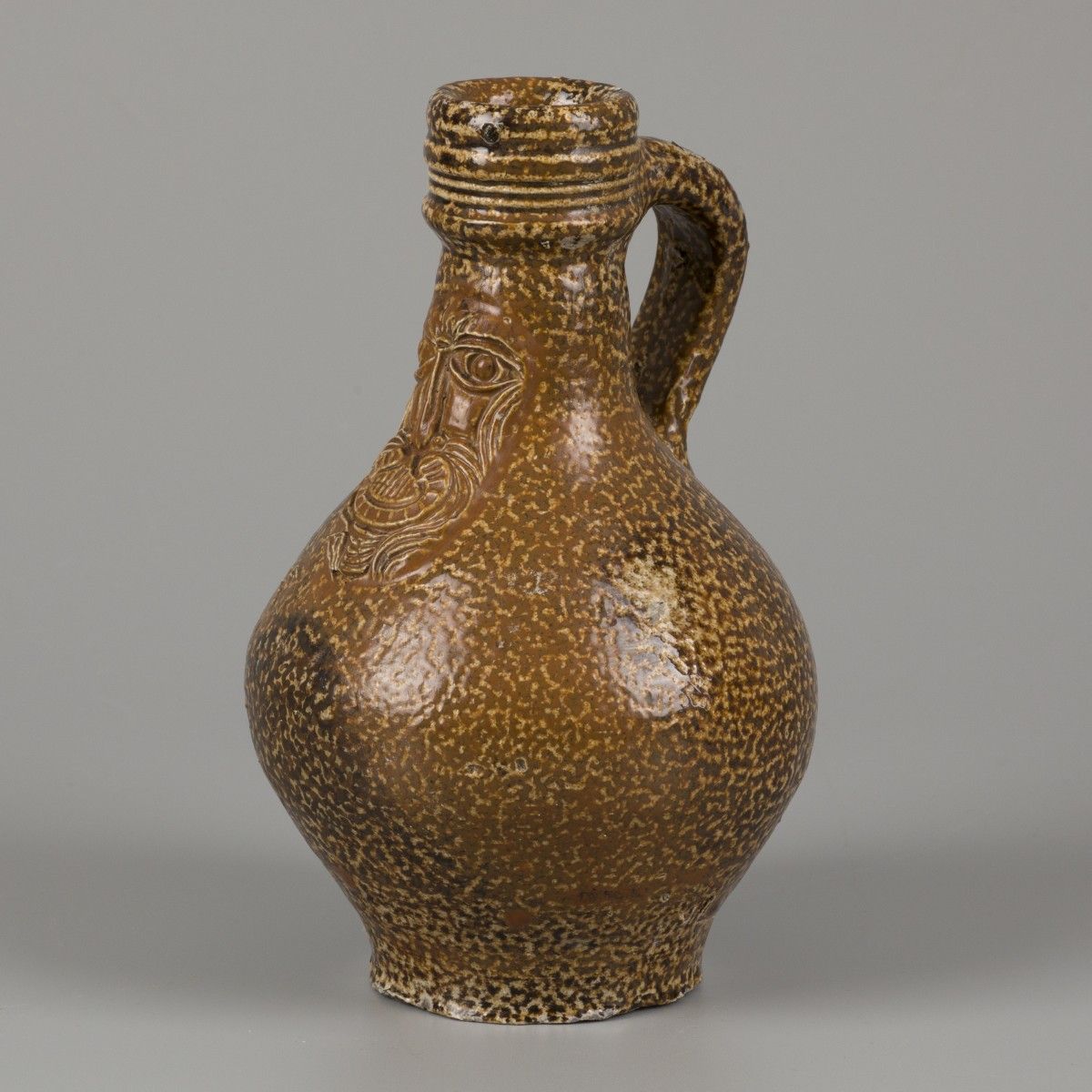 A bartmann/ 'Bartmann' stoneware jug with tiger salt glaze, (Cologne/ Frechen), &hellip;