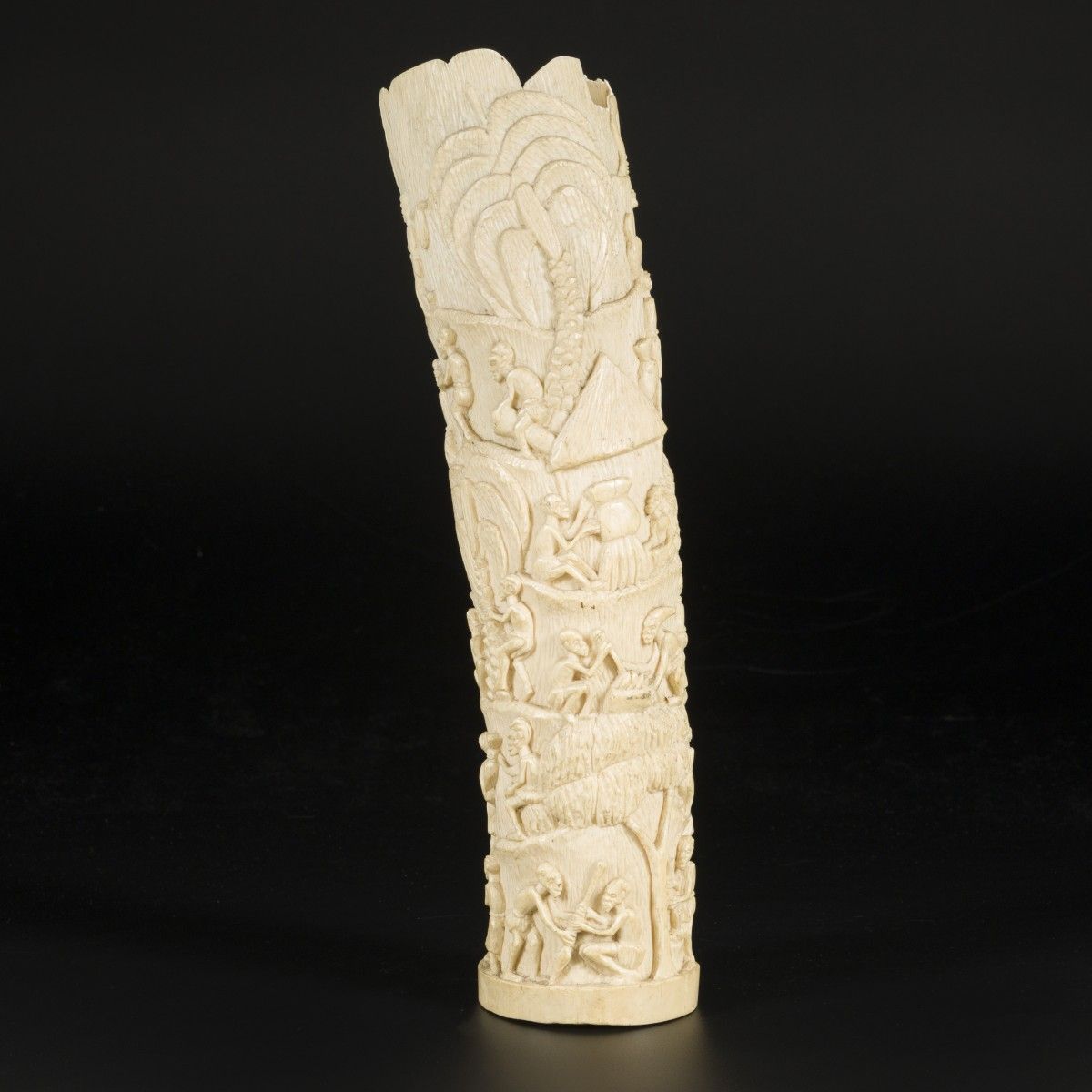 An ivory carving with depictions of African villagers, DRC, ca. 1920/30. Abm. 37&hellip;