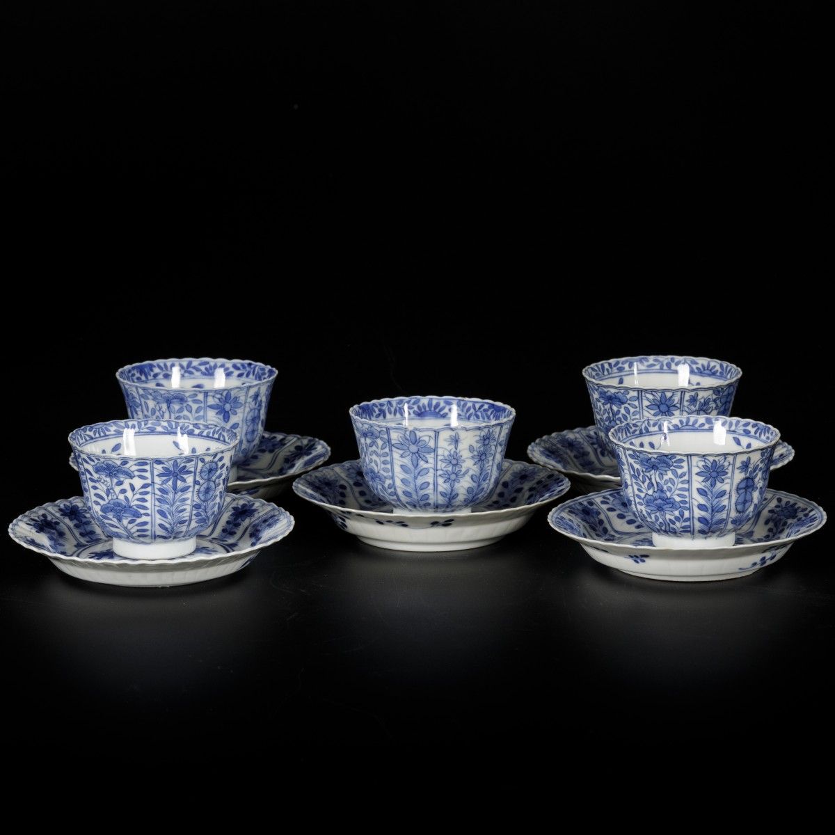 A set of (5) porcelain cups and saucers with floral decor, marked Kangxi. China,&hellip;