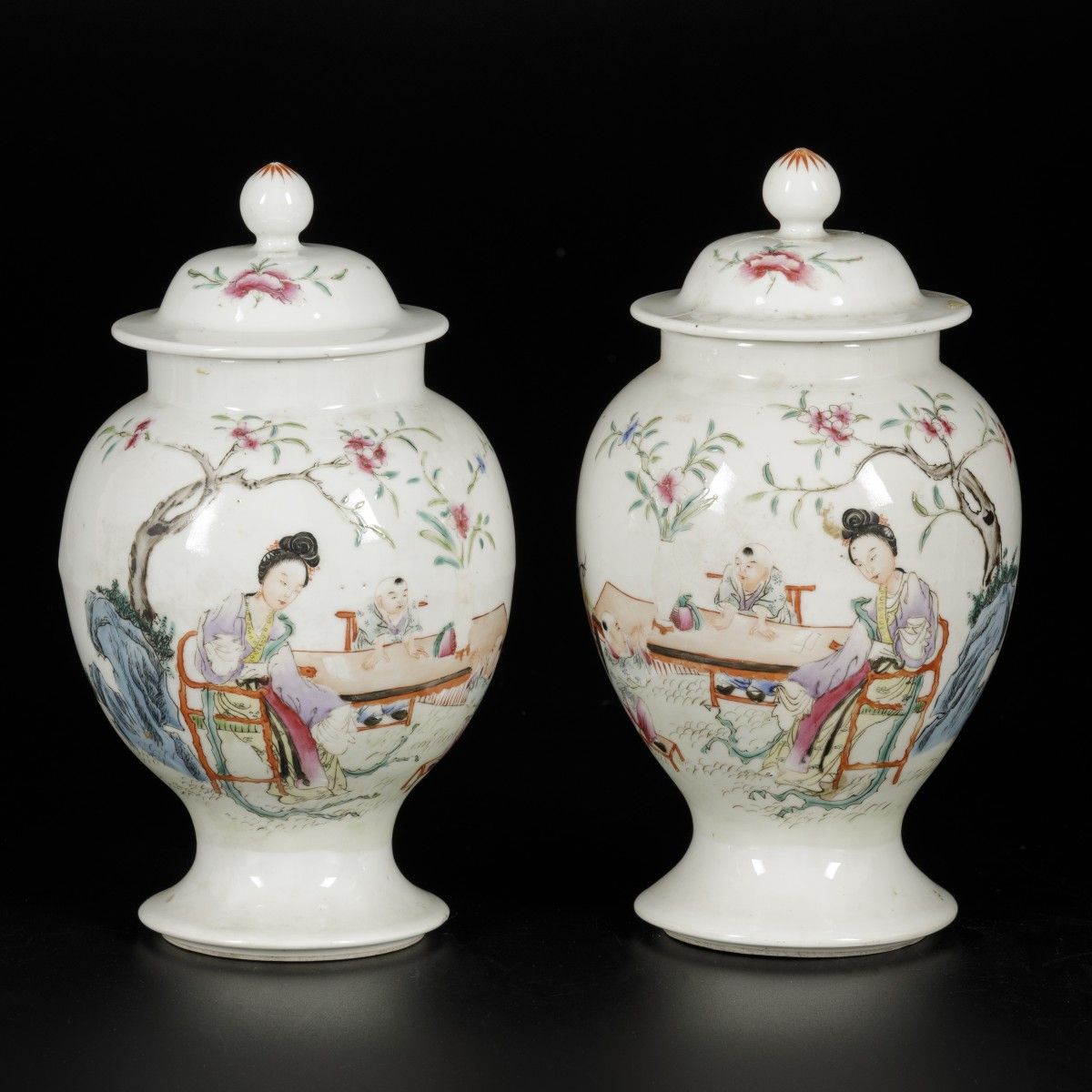 A set of (2) lidded vases with famille rose decor, marked Qianglong, China, 20th&hellip;
