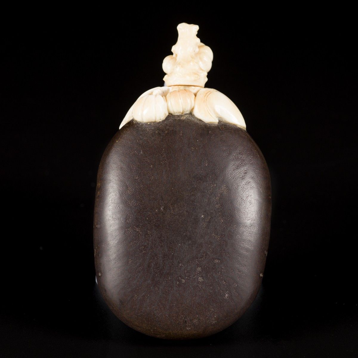 A walnut snuff bottle with bone fittings, China, 19th century. H. 8 cm. Estimati&hellip;