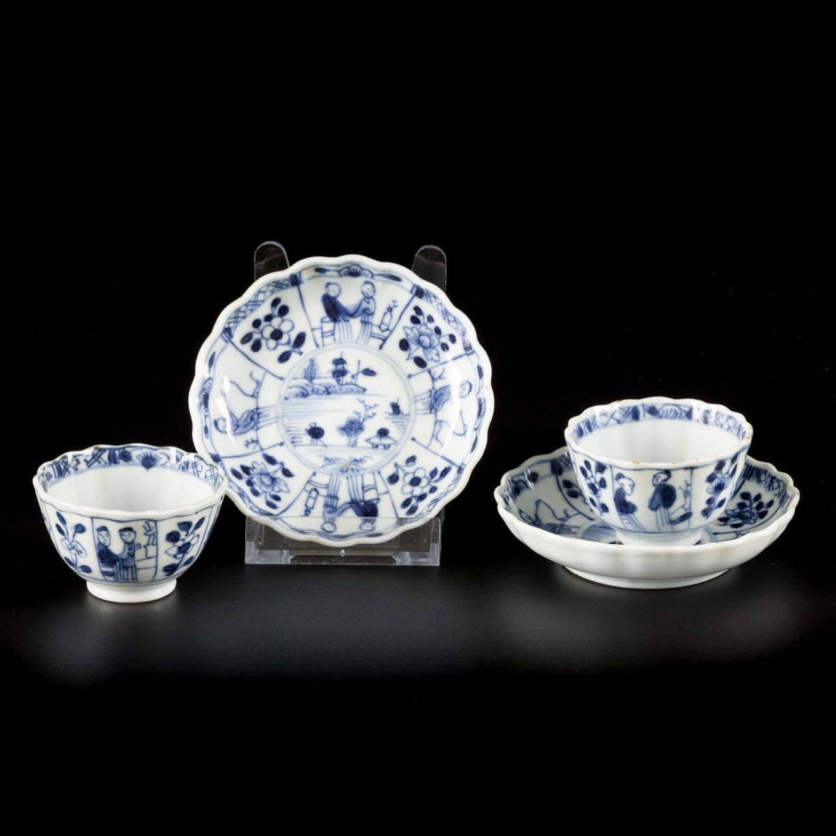 A set of (2) cups and saucers with a decoration of figures in compartments, Chin&hellip;