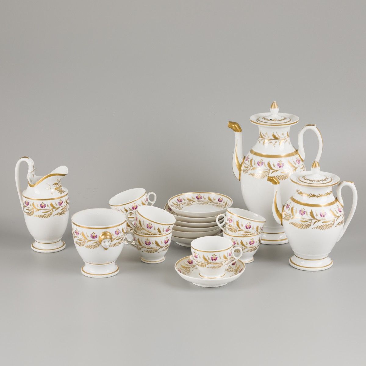 A porcelain coffee/tea set with floral decorations, France, early 19th century. &hellip;