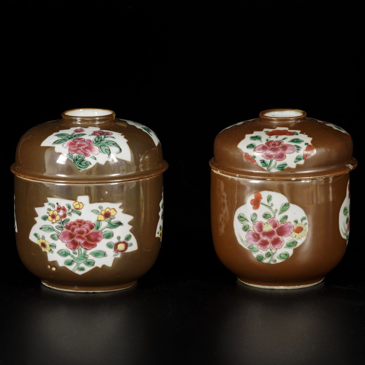 A lot of (2) porcelain lidded pots with famille rose decor on capucine fond, Chi&hellip;