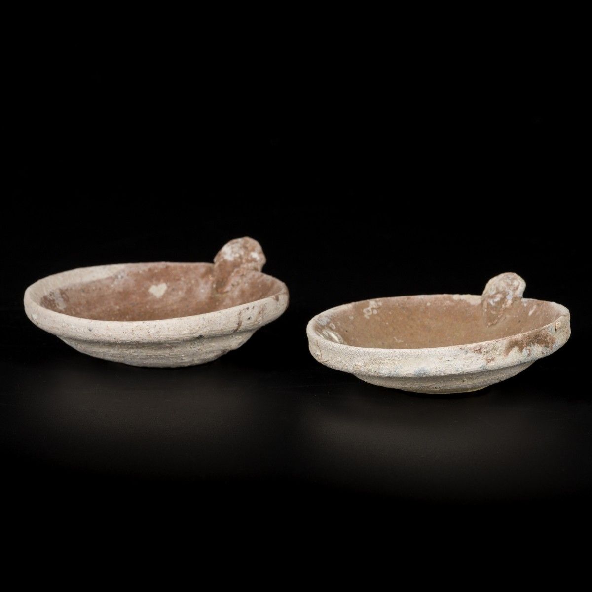 A lot comprised of (2) stoneware oil lamps Vung Tao Cargo (Christies 1992), Chin&hellip;