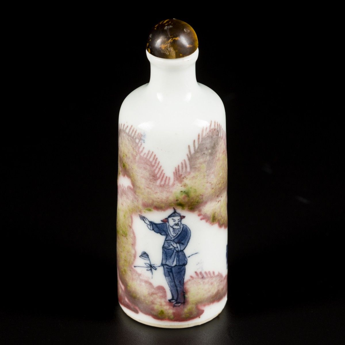 A porcelain iron-red snuff bottle decorated with street artists, marked Yongzhen&hellip;