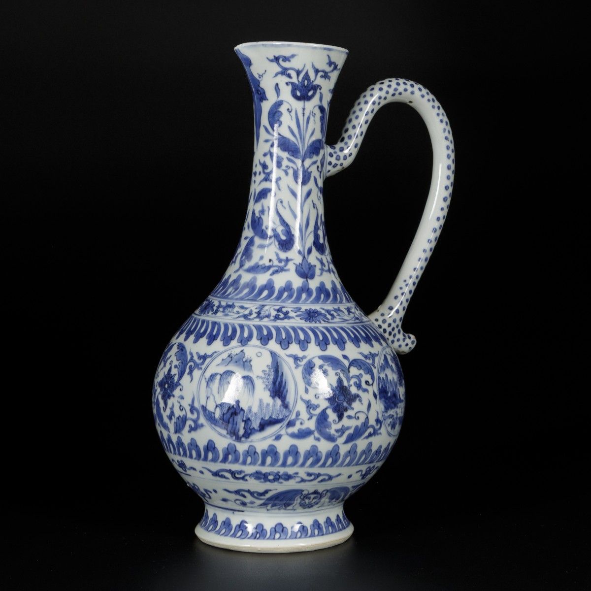 A porcelain blue-white pouring jug with floral decorations and landscape decors &hellip;