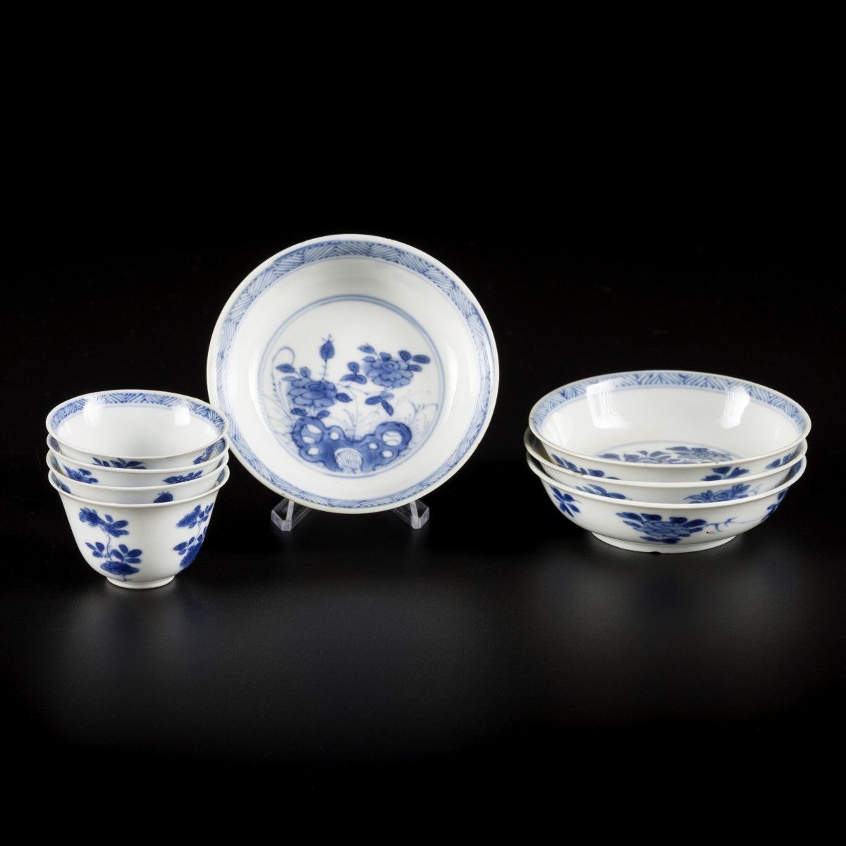 A set of (4) porcelain miniature cups and saucers with floral decoration, China,&hellip;
