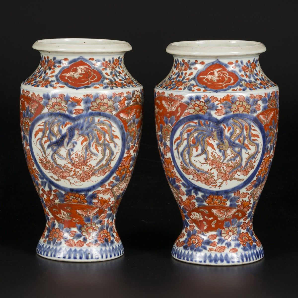 A set of (2) porcelain vases with Imari decoration, marked underneath, Japan, 19&hellip;