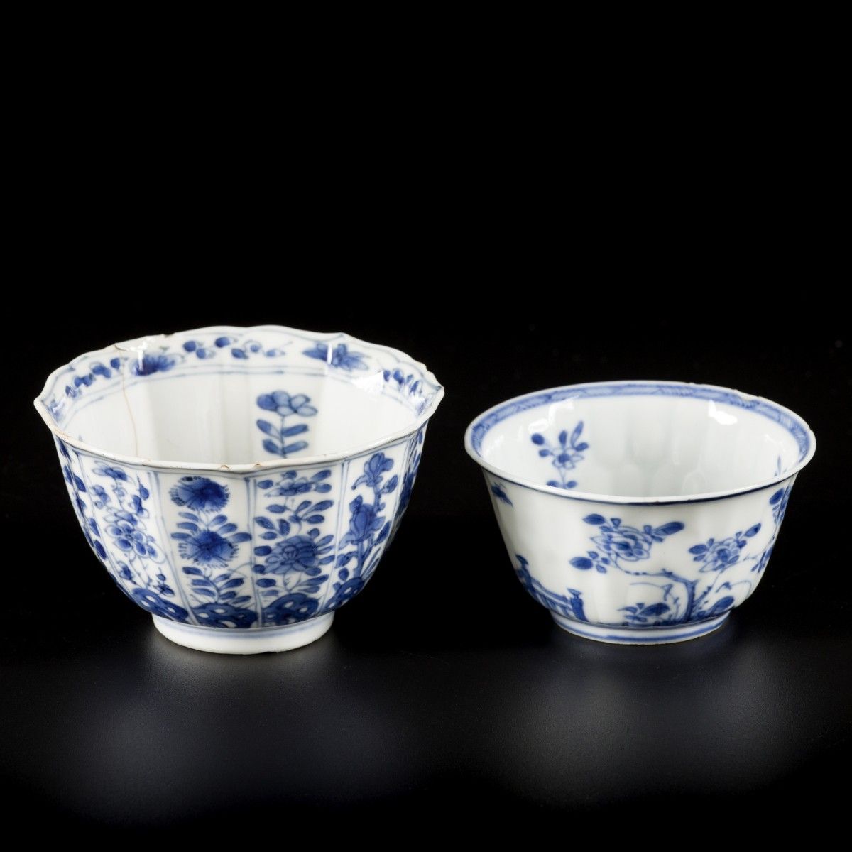A lot comprised of (2) porcelain cups with floral decoration, one marked with yu&hellip;