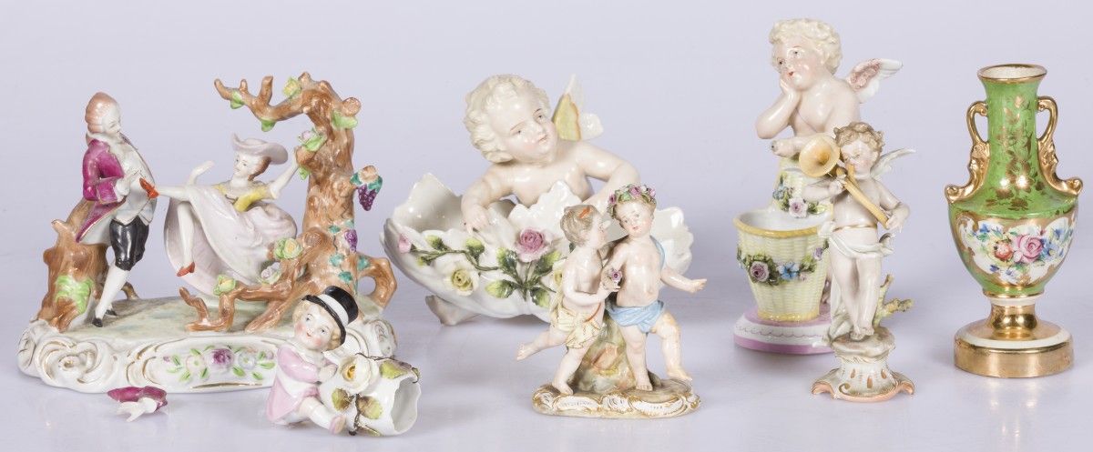 A lot of various porcelain items including a sculpture group of a man and woman &hellip;