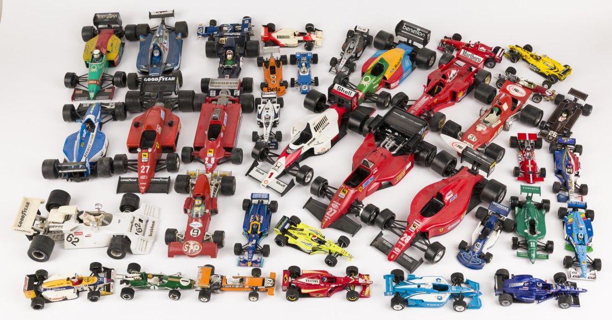 (37) piece lot Formula 1 model cars Consisting of various brands including Mebet&hellip;