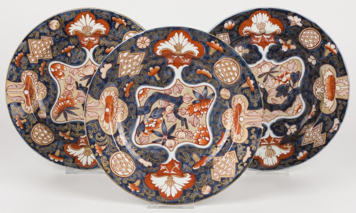 A set of (3) Japanese deep plates, Imari decoration. Hairlines and chips.