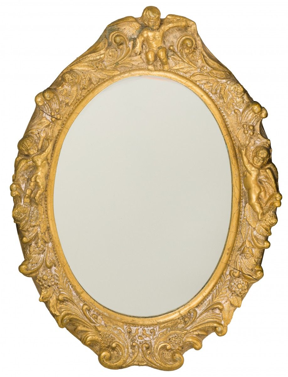 An oval gold painted mirror frame with decorative relief, 2nd half 20th century.&hellip;