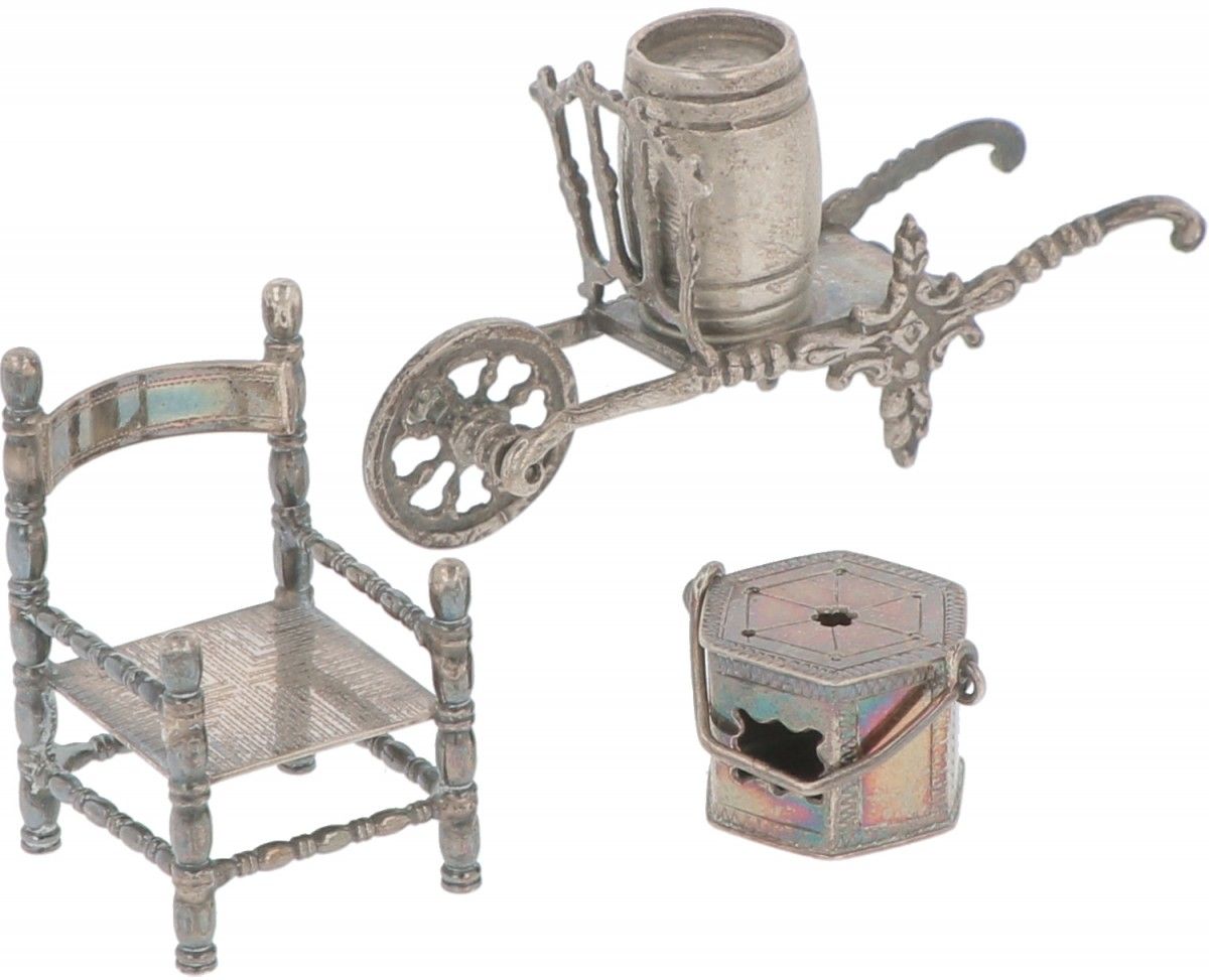 (3) Piece lot miniatures silver. Consisting of a chair, wheelbarrow with beer ba&hellip;
