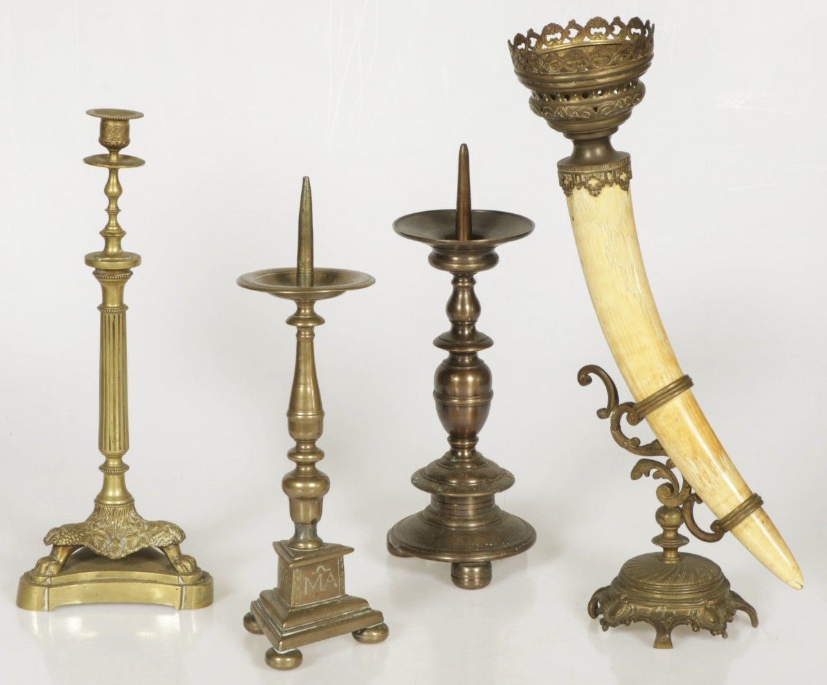 A lot of various bronze candlesticks and a horn with bronze fittings, 19th centu&hellip;