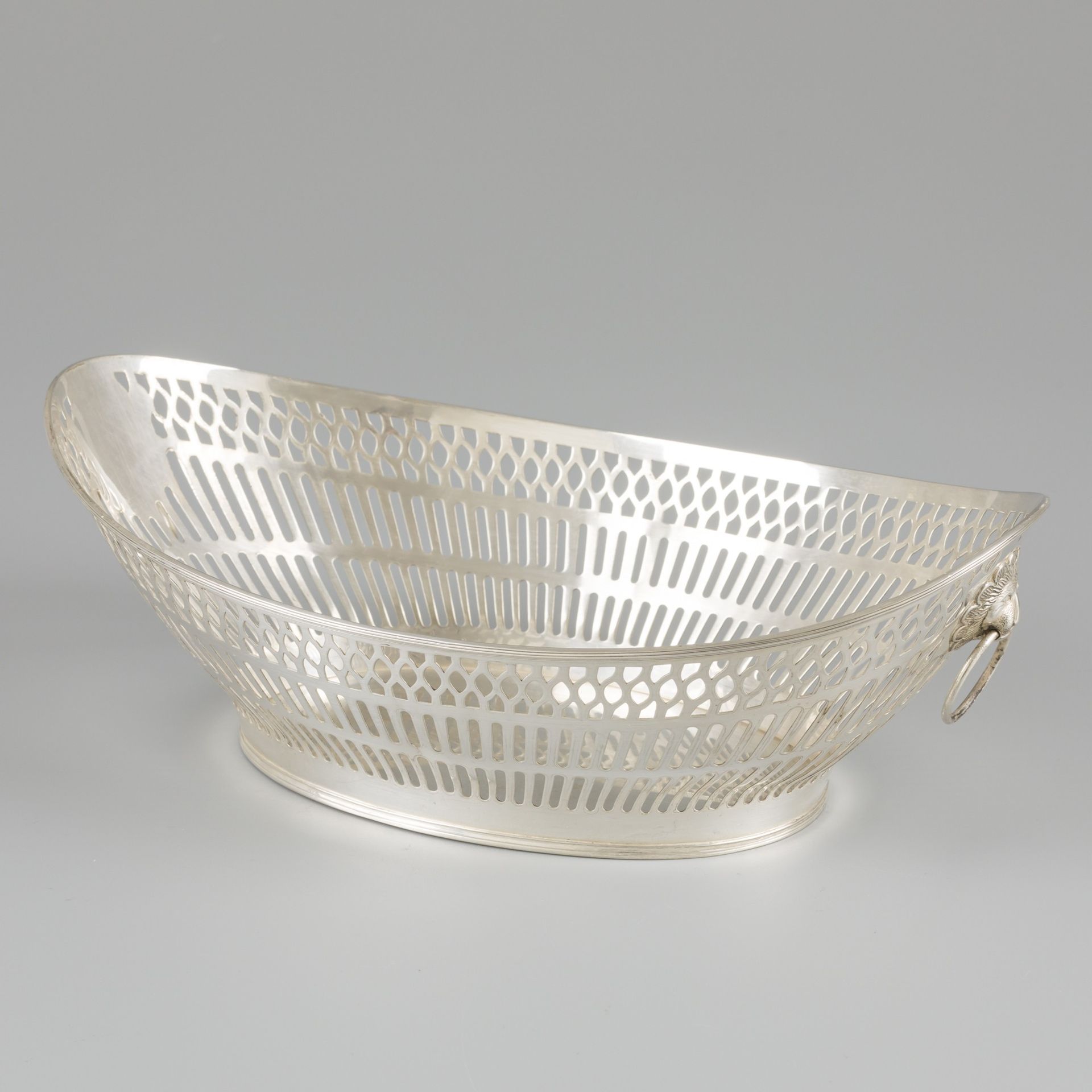 Bread basket silver. Oval model with openwork sides, edging at the top and foot &hellip;