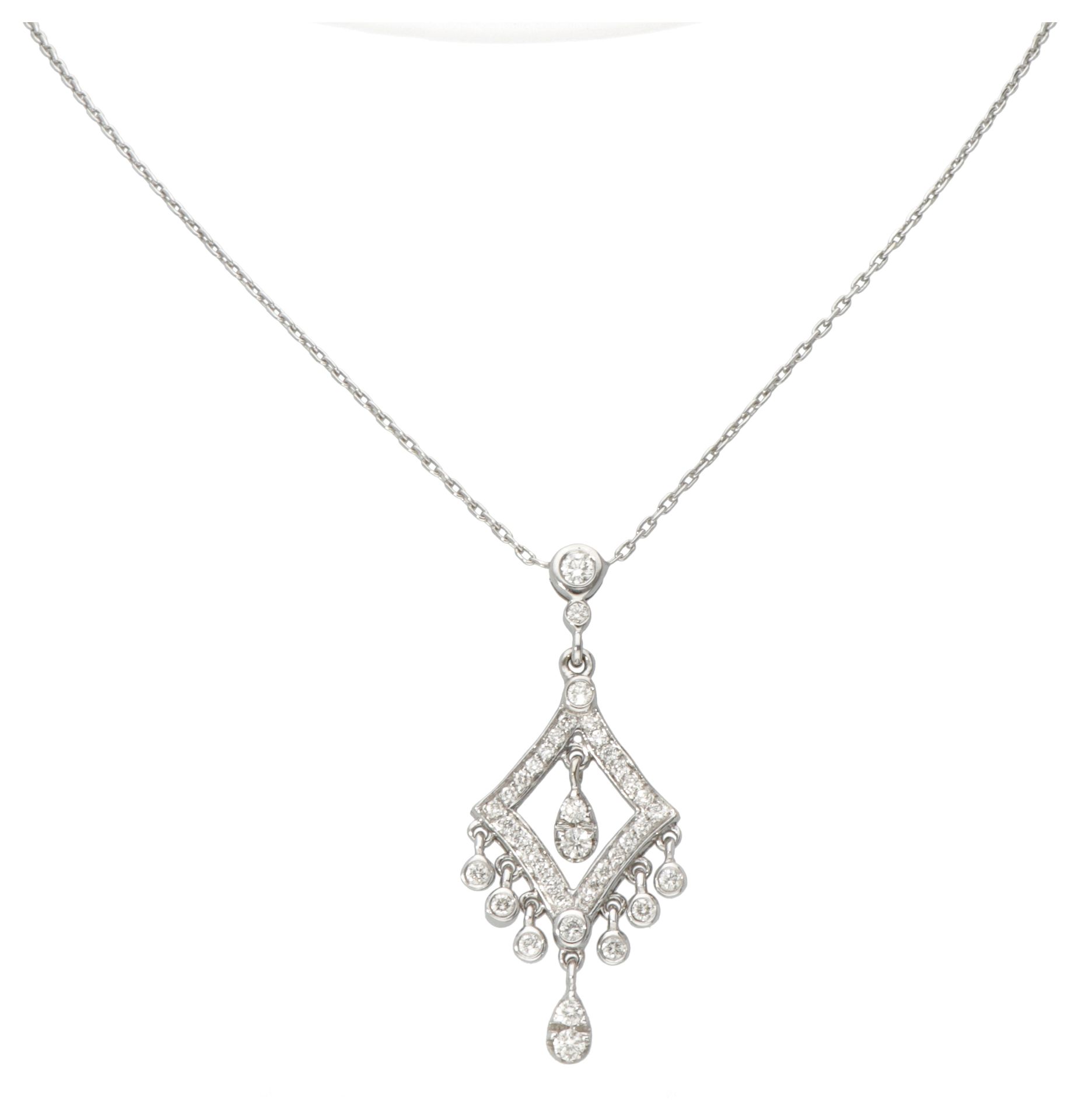 18K. White gold necklace and pendant set with approx. 0.62 ct. Diamond. 印章：750。镶&hellip;