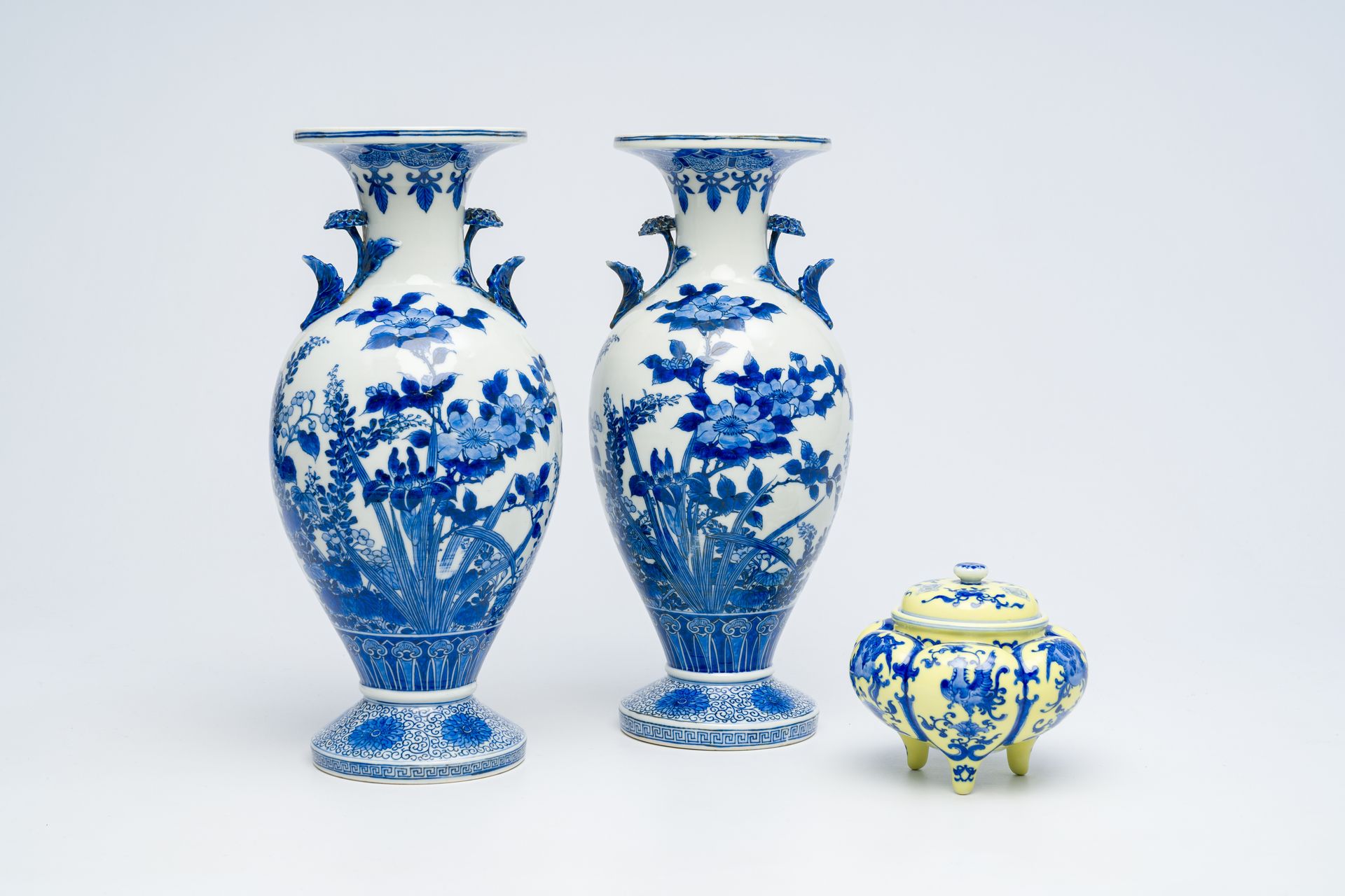 A Japanese yellow-ground incense burner and a pair of blue and white vases, poss&hellip;
