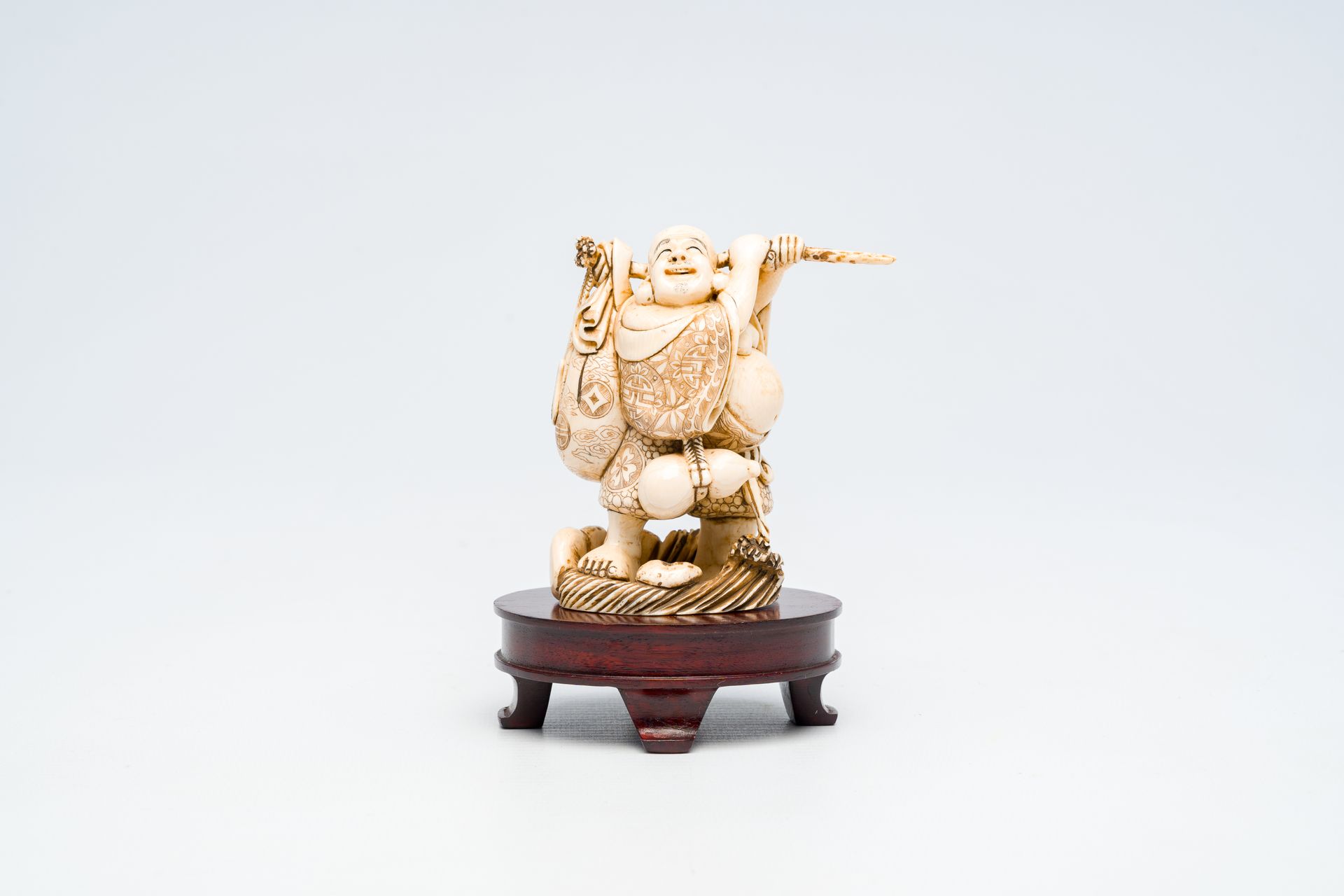 A Japanese ivory 'Happy Bouddha' okimono, signed, Meiji, late 19th C. Okimono ja&hellip;