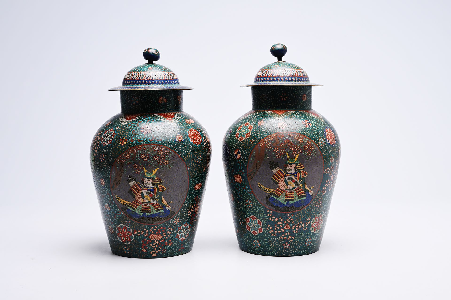 A pair of Japanese cloisonne 'dragon and samurai' vases and covers, Meiji, ca. 1&hellip;