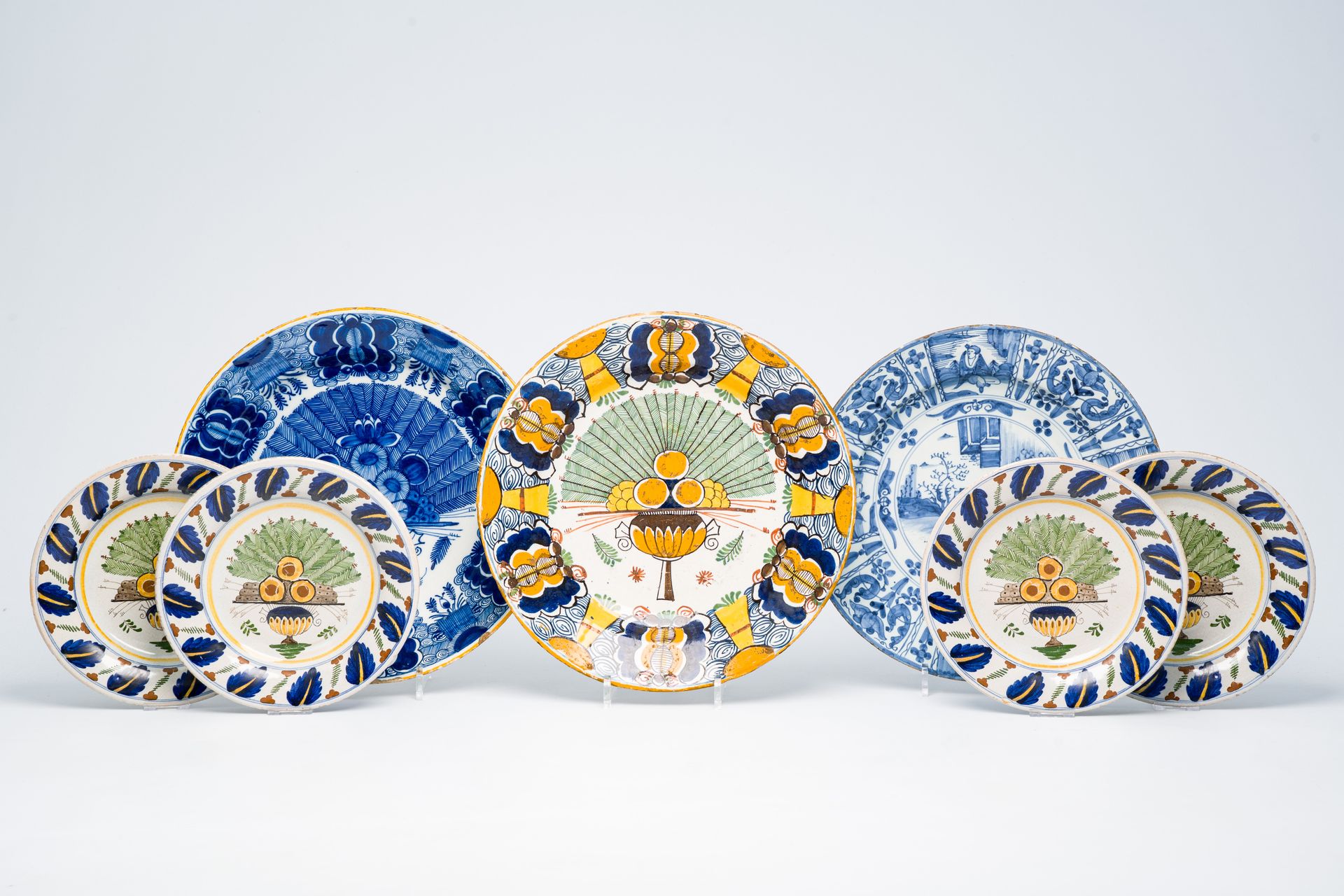 Seven Dutch Delft blue, white and polychrome plates and dishes with floral and c&hellip;