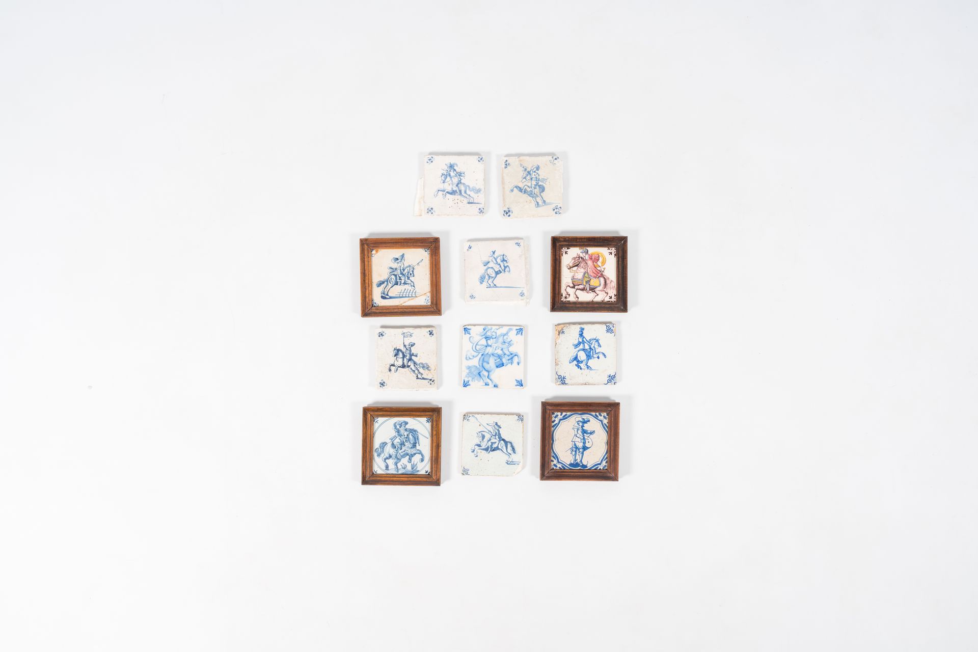 Eleven blue and white and polychrome Dutch Delft tiles with horses and riders, 1&hellip;
