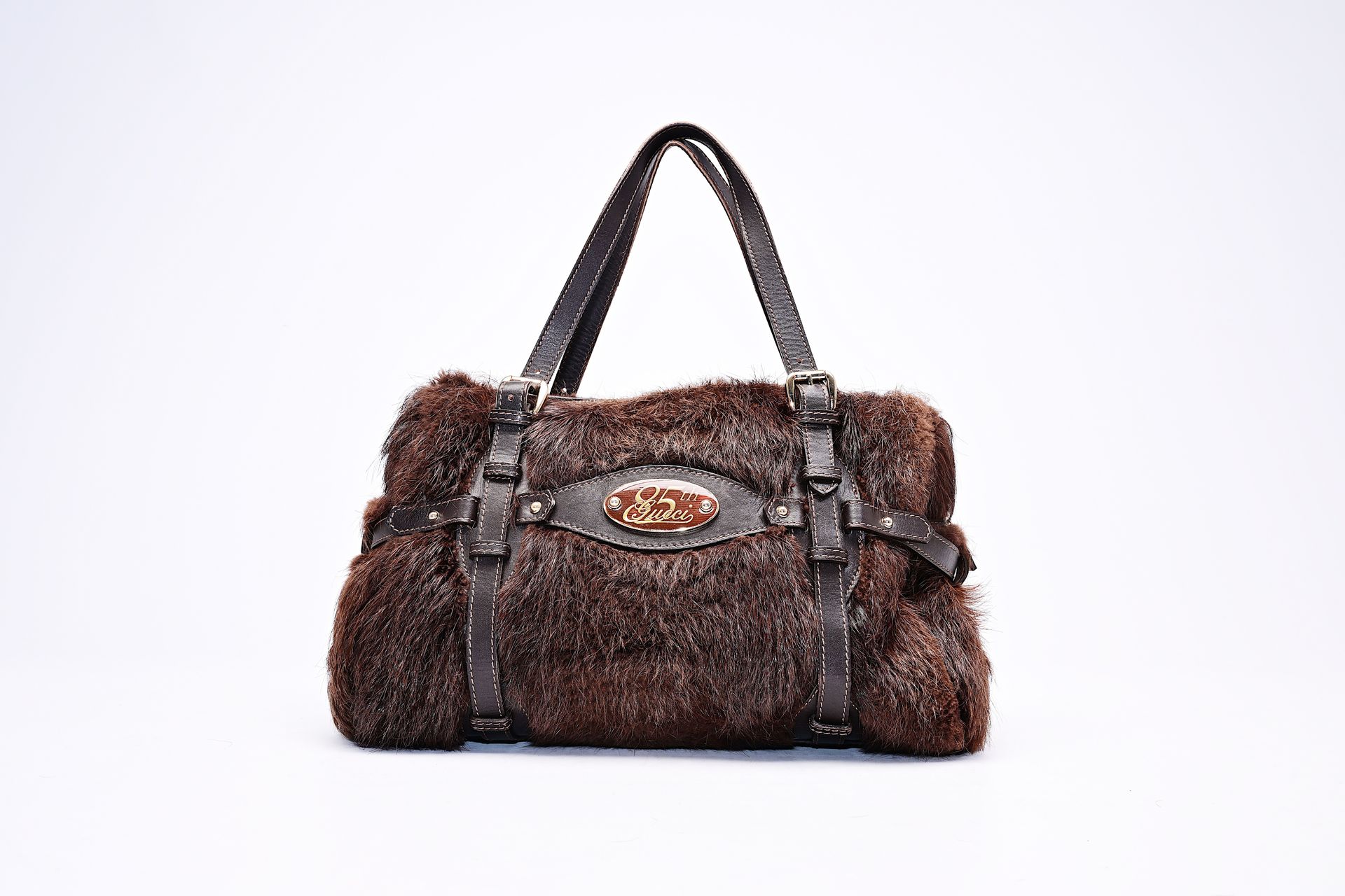 An Italian Gucci limited edition 85th anniversary fur and leather handbag, 20th &hellip;