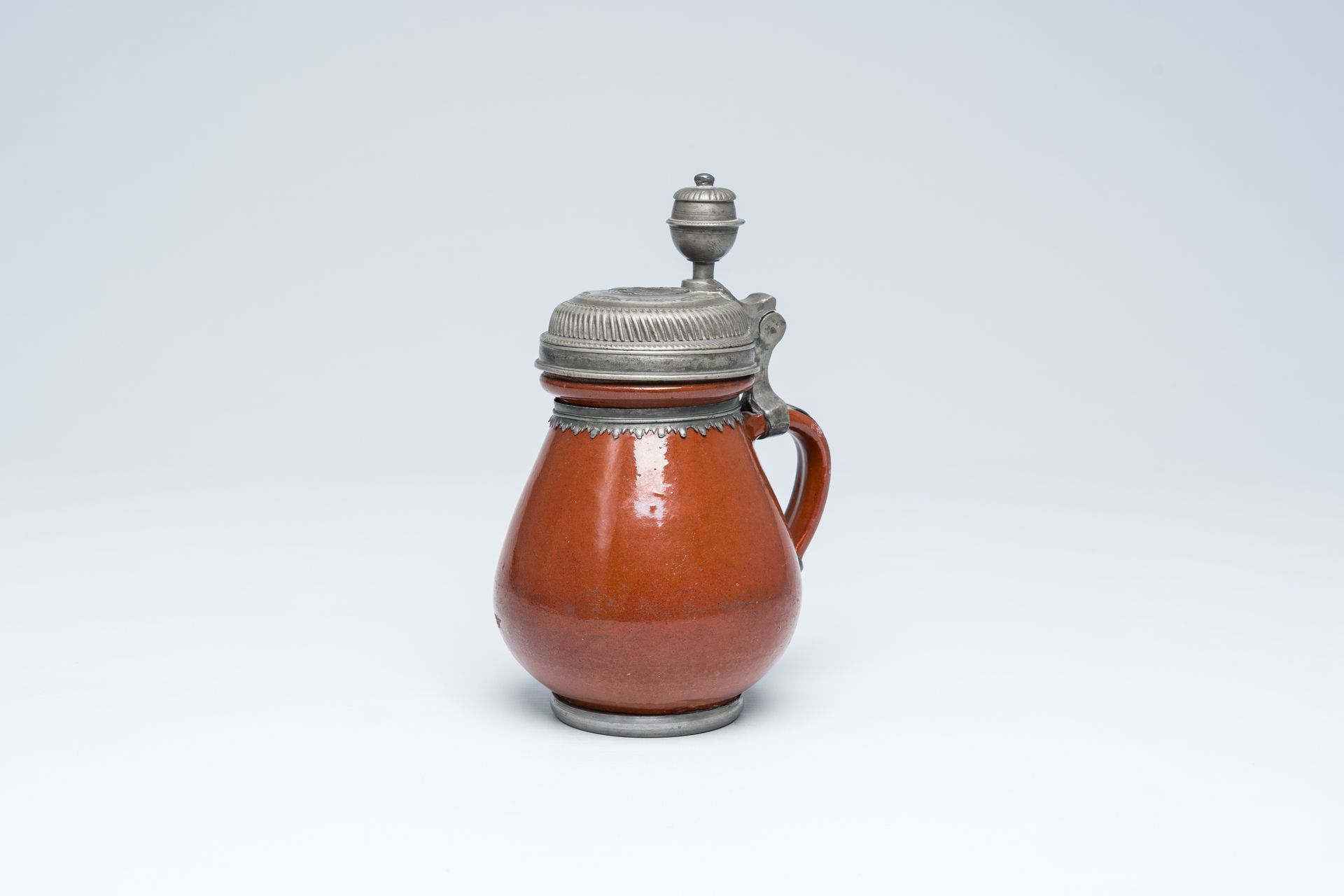 A German stoneware jug with pewter lid depicting the Adoration of the Shepherds,&hellip;