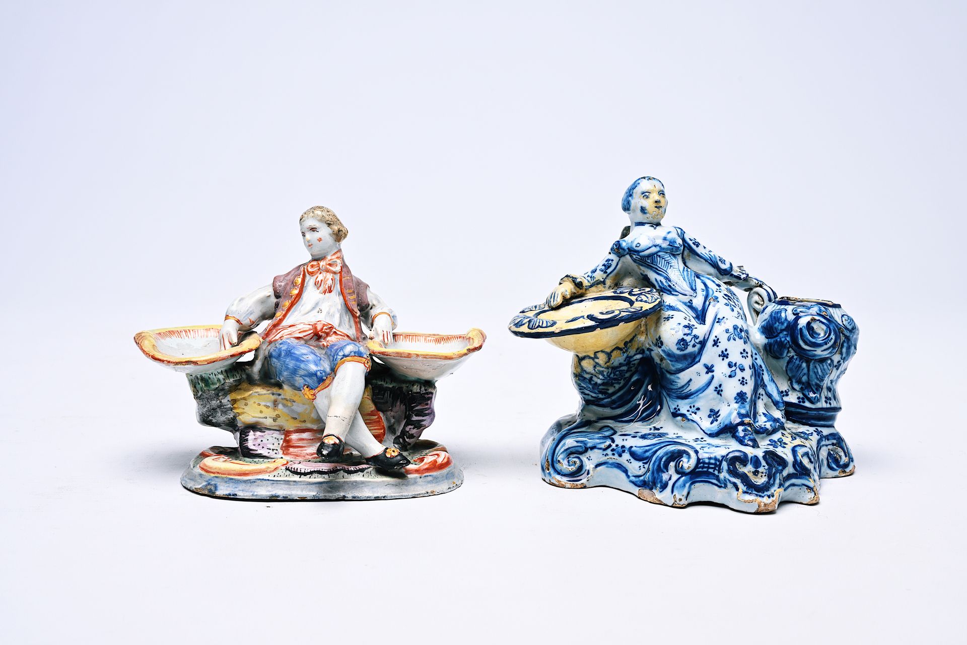 Two Dutch Delft blue and white and polychrome salts in the form of a man and a w&hellip;