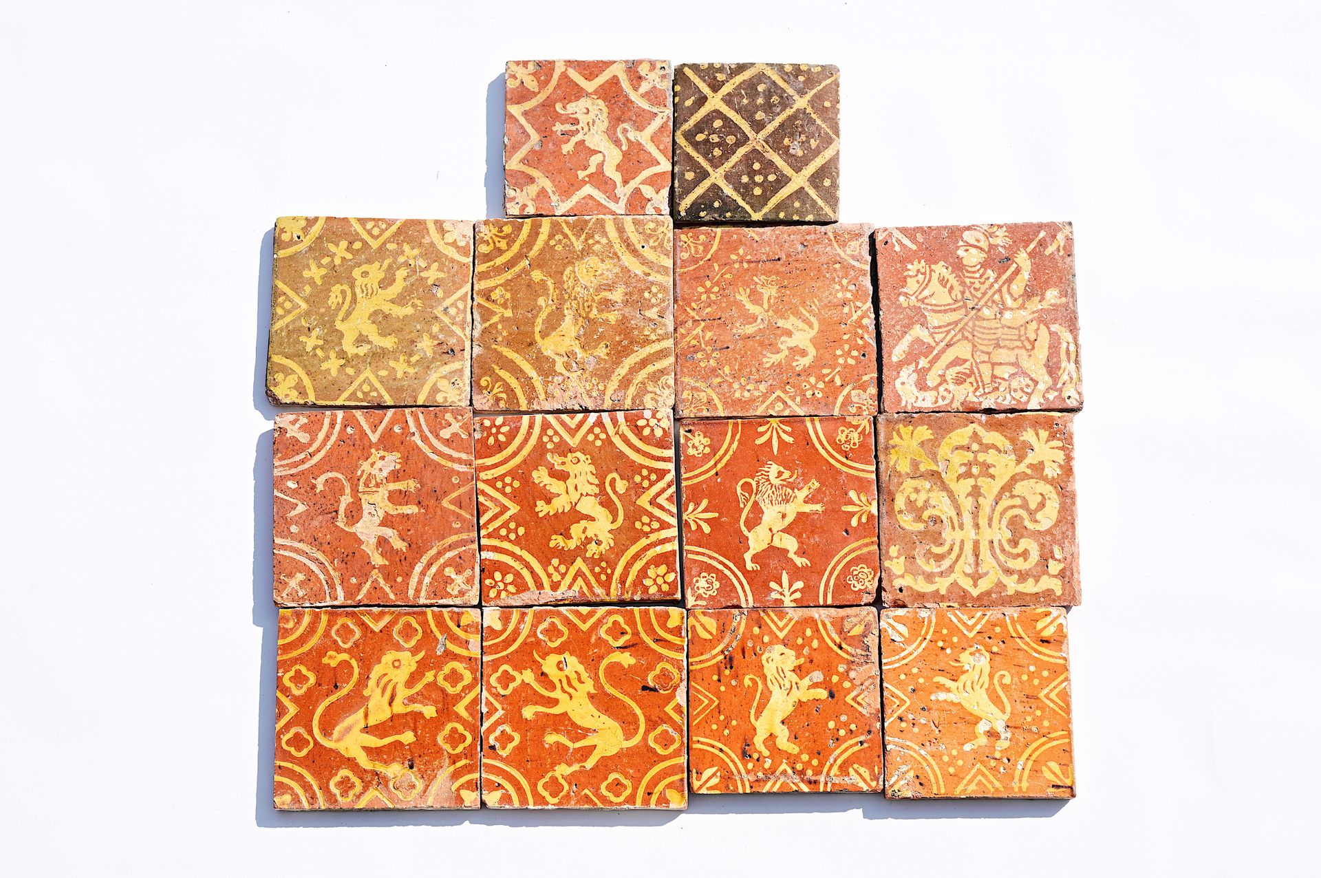 Fourteen Flemish decorated redware tiles in medieval style, 18th/19th C. Catorce&hellip;