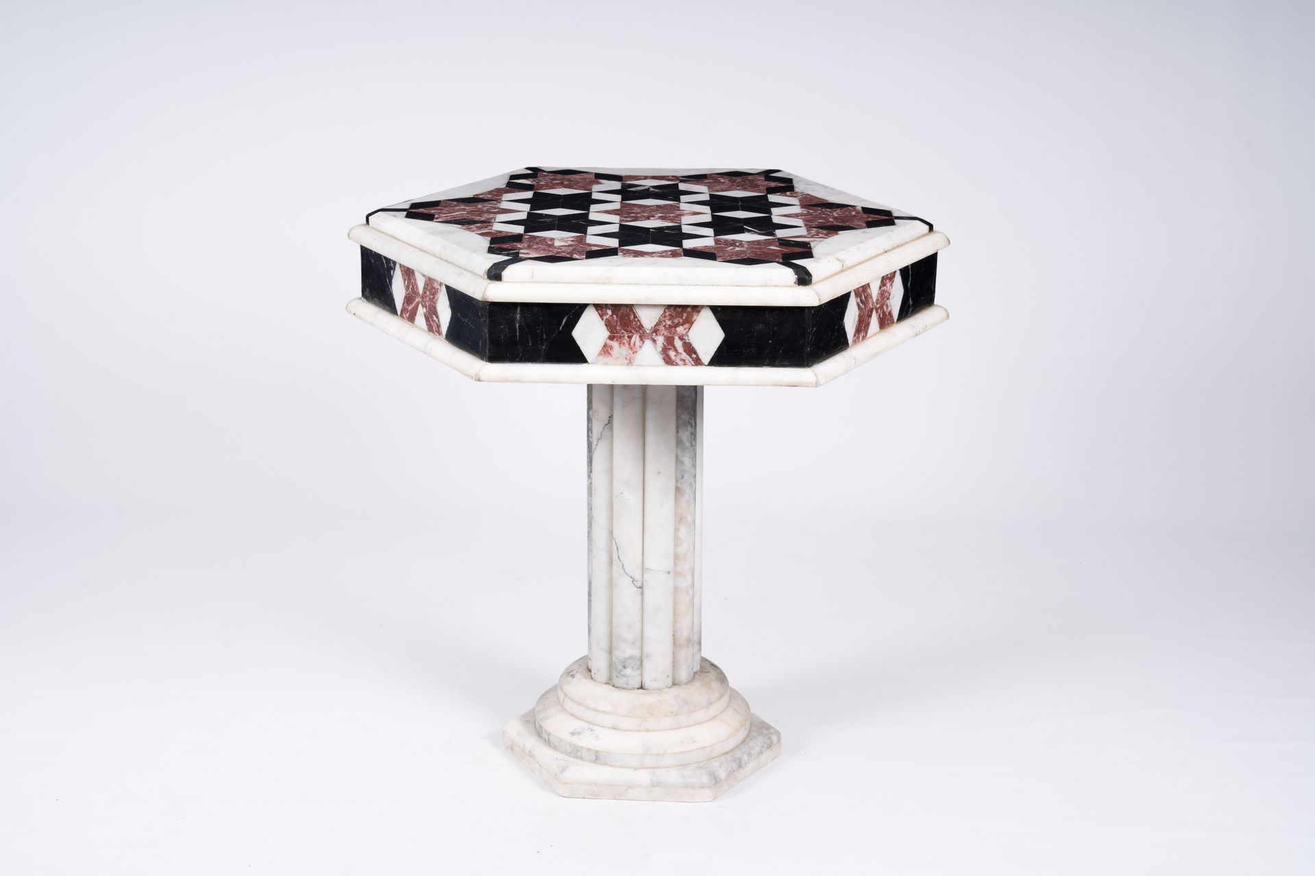 An Italian hexagonal marble side table with geometric design, 20th C. Tavolino i&hellip;