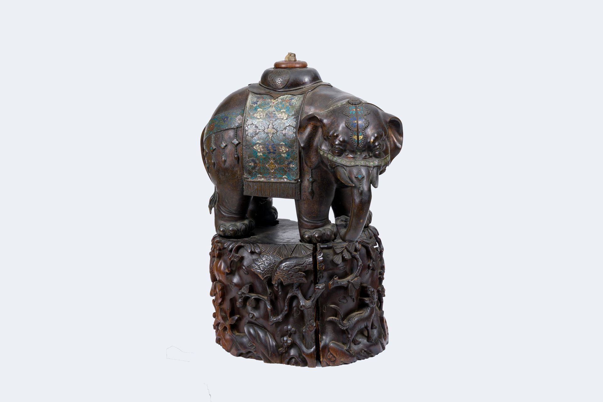 A large Japanese bronze and champleve enamel elephant on a carved wood base, Mei&hellip;